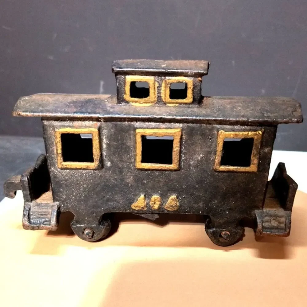 586. Vintage Cast Iron Caboose #404 Train piece